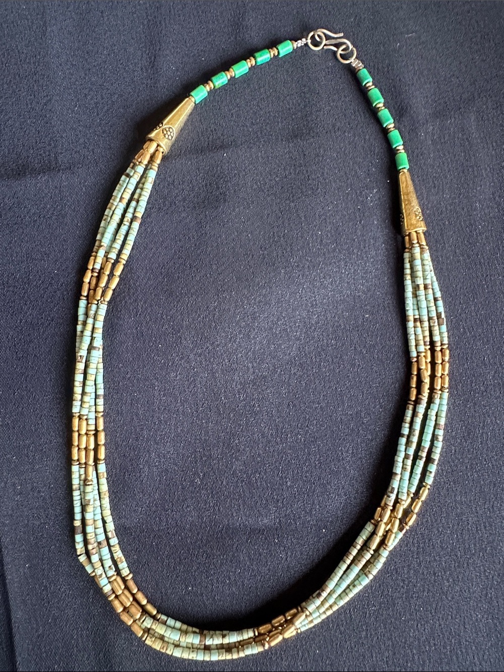 Wooden & acrylic EUC five-strand beaded necklace. Goldtone spacers & caps